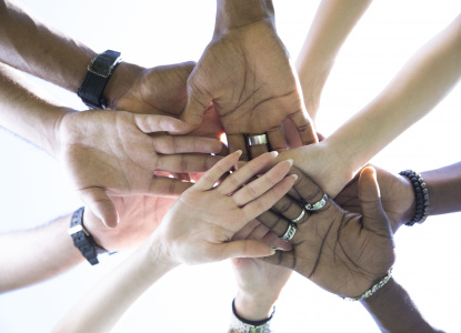 bottom-view-people-putting-hands-together
